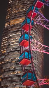 Preview wallpaper ferris wheel, building, skyscraper, backlight, night