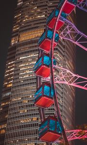 Preview wallpaper ferris wheel, building, skyscraper, backlight, night