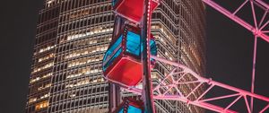 Preview wallpaper ferris wheel, building, skyscraper, backlight, night