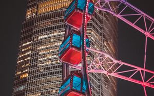 Preview wallpaper ferris wheel, building, skyscraper, backlight, night