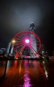 Preview wallpaper ferris wheel, buildings, skyscrapers, city, night