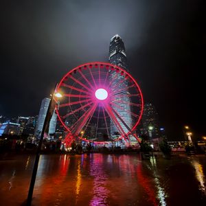 Preview wallpaper ferris wheel, buildings, skyscrapers, city, night