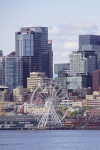 Preview wallpaper ferris wheel, buildings, skyscrapers, architecture, city