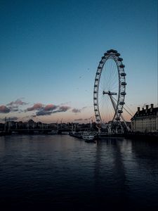 Preview wallpaper ferris wheel, city, buildings, water, dusk