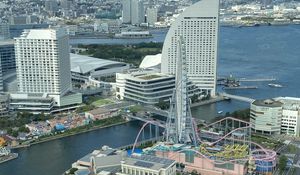 Preview wallpaper ferris wheel, city, buildings, cityscape, aerial view