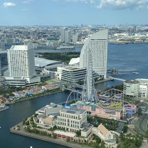 Preview wallpaper ferris wheel, city, buildings, cityscape, aerial view