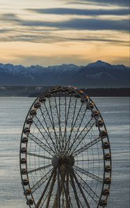 Preview wallpaper ferris wheel, sea, mountains