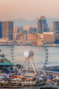 Preview wallpaper ferris wheel, water, buildings, city