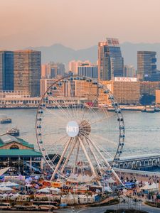 Preview wallpaper ferris wheel, water, buildings, city