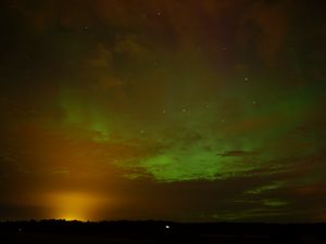 Preview wallpaper field, clouds, sunset, northern lights, stars, sky, dark