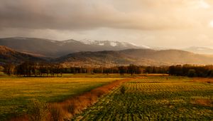 Preview wallpaper field, grass, mountains, hills, landscape