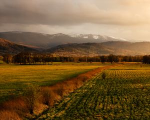 Preview wallpaper field, grass, mountains, hills, landscape