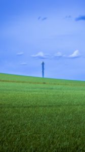 Preview wallpaper field, grass, tower, sky, nature, minimalism