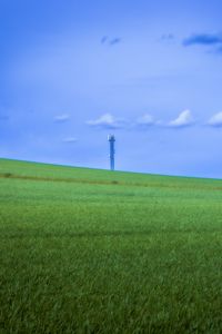 Preview wallpaper field, grass, tower, sky, nature, minimalism