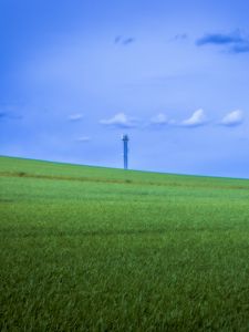 Preview wallpaper field, grass, tower, sky, nature, minimalism