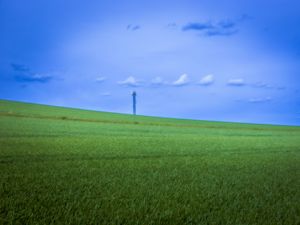 Preview wallpaper field, grass, tower, sky, nature, minimalism