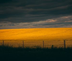 Preview wallpaper field, hill, clouds, dark, landscape