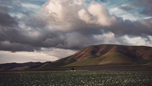 Preview wallpaper field, hills, clouds, landscape, relief