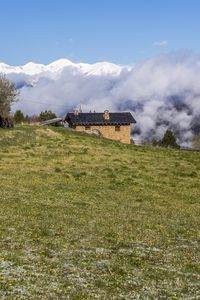 Preview wallpaper field, house, clouds, mountains, nature