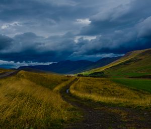 Preview wallpaper field, mountains, hills, clouds, landscape