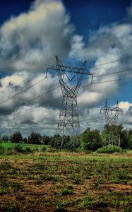 Preview wallpaper field, poles, wires, clouds, landscape