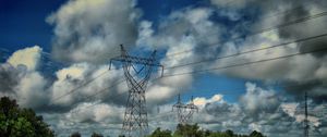 Preview wallpaper field, poles, wires, clouds, landscape