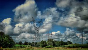 Preview wallpaper field, poles, wires, clouds, landscape