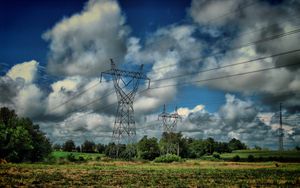 Preview wallpaper field, poles, wires, clouds, landscape