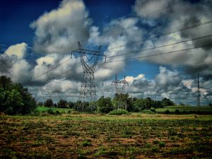 Preview wallpaper field, poles, wires, clouds, landscape