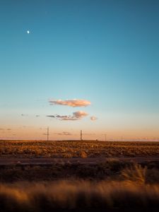 Preview wallpaper field, road, curb, journey, evening