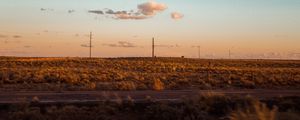 Preview wallpaper field, road, curb, journey, evening