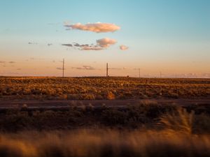 Preview wallpaper field, road, curb, journey, evening