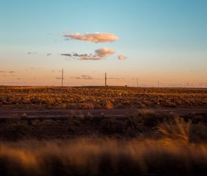 Preview wallpaper field, road, curb, journey, evening