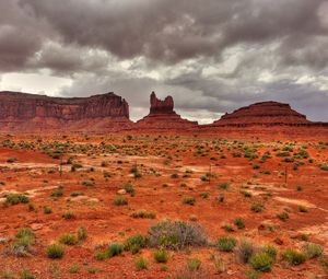 Preview wallpaper field, rocks, clouds, landscape