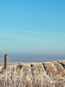 Preview wallpaper field, sky, hill, protection, column, wire