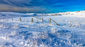 Preview wallpaper field, snow, hills, fence, winter