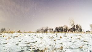 Preview wallpaper field, snow, starry sky, night, winter