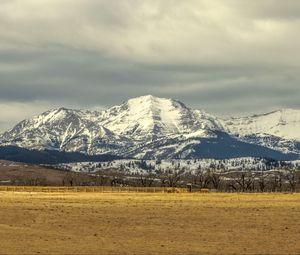 Preview wallpaper field, trees, mountains, snow, nature