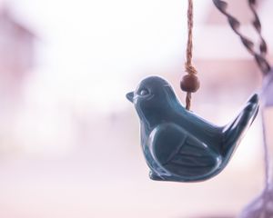 Preview wallpaper figure, bird, pendant