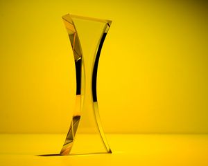 Preview wallpaper figurine, glass, figure, yellow, minimalism