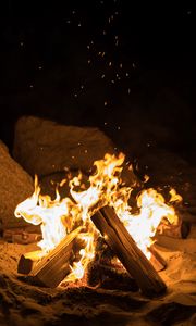 Preview wallpaper fire, bonfire, firewood, sparks, flame, night