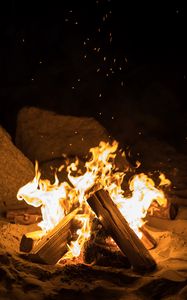 Preview wallpaper fire, bonfire, firewood, sparks, flame, night