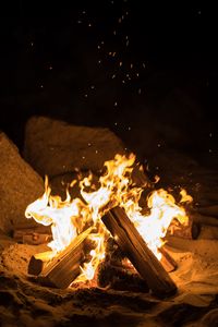 Preview wallpaper fire, bonfire, firewood, sparks, flame, night