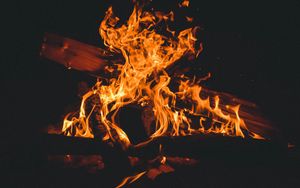 Preview wallpaper fire, bonfire, firewood, flame, dark, burning