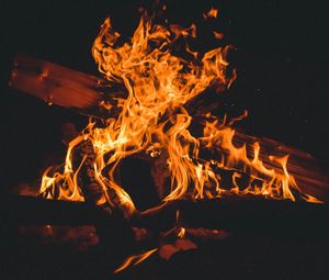 Preview wallpaper fire, bonfire, firewood, flame, dark, burning