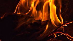 Preview wallpaper fire, bonfire, flame, dark, firewood, burning