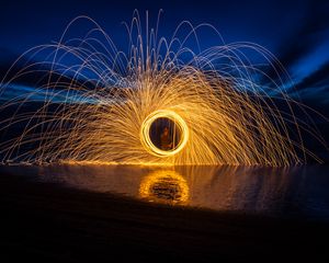 Preview wallpaper fire, circle, sparks, freezelight, dark