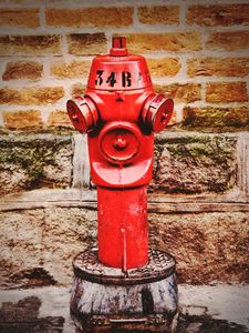 Preview wallpaper fire hydrant, brick wall, outdoor
