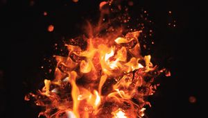 Preview wallpaper fire, sparks, dark, glare, bokeh