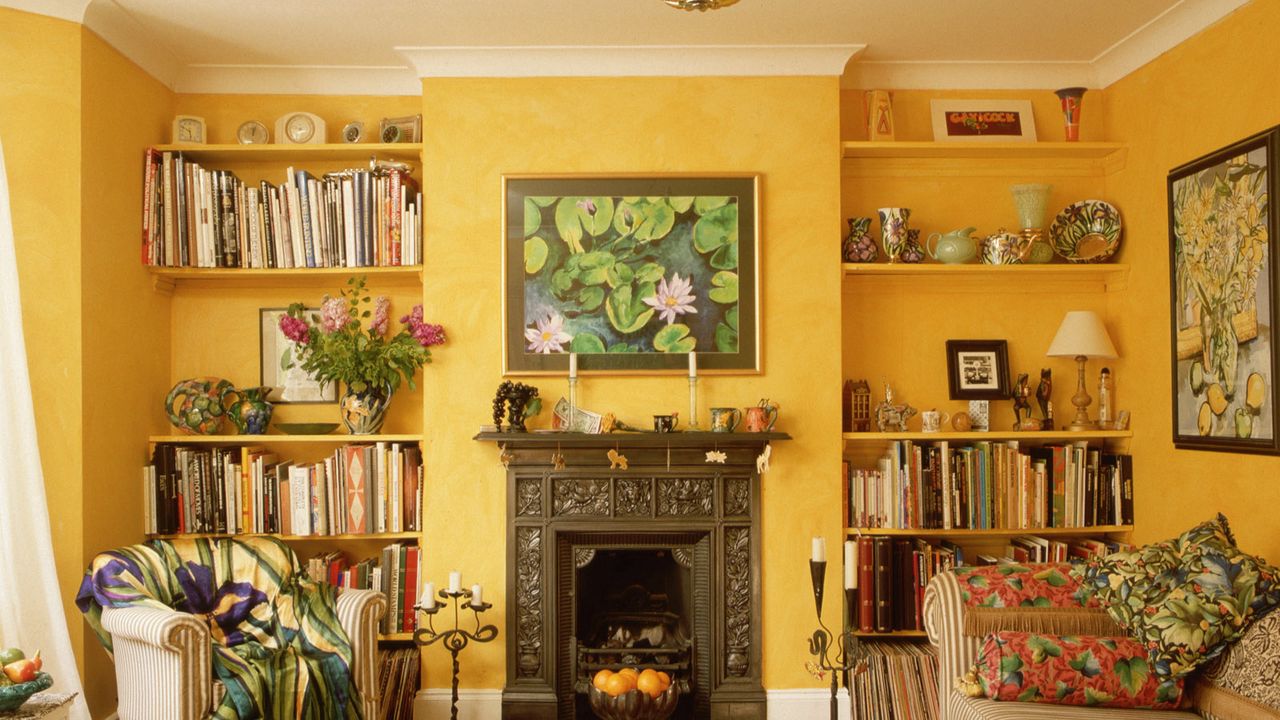 Wallpaper fireplace, books, shelves, sofa, table